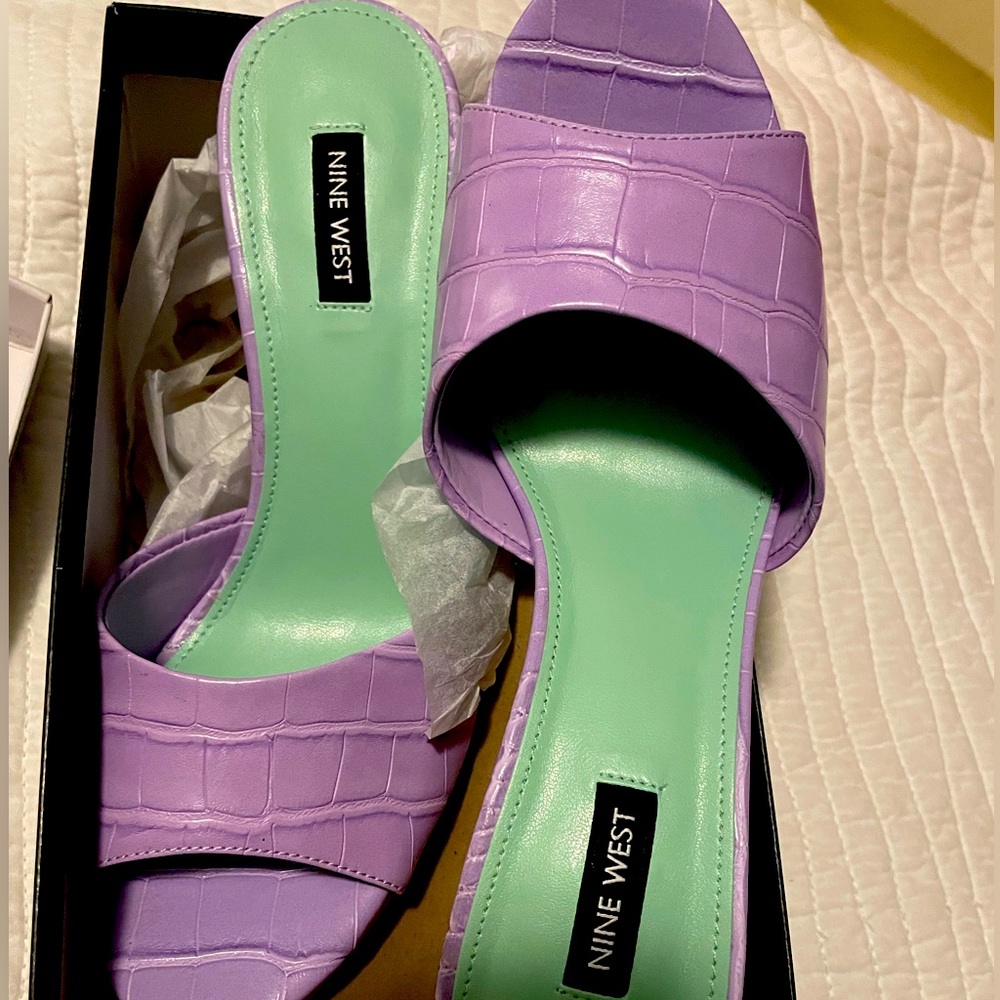 Brand New, Never worn Nine West pump slides with purple croc detail.